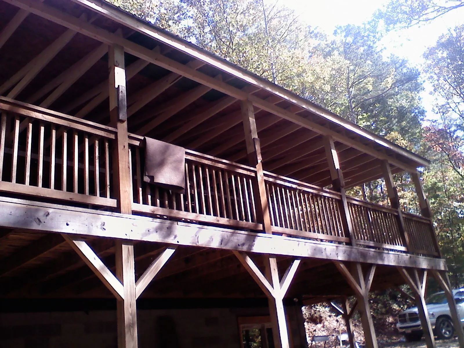 Timber framing under a new elevated porch and deck — Roof Leak Repair in Wyatt by Roofing Brothers